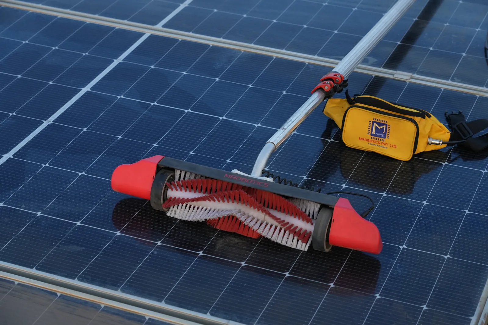 Aqualess waterless solar panel cleaning system