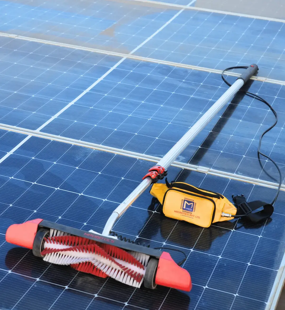 Aqualess waterless solar panel cleaning system